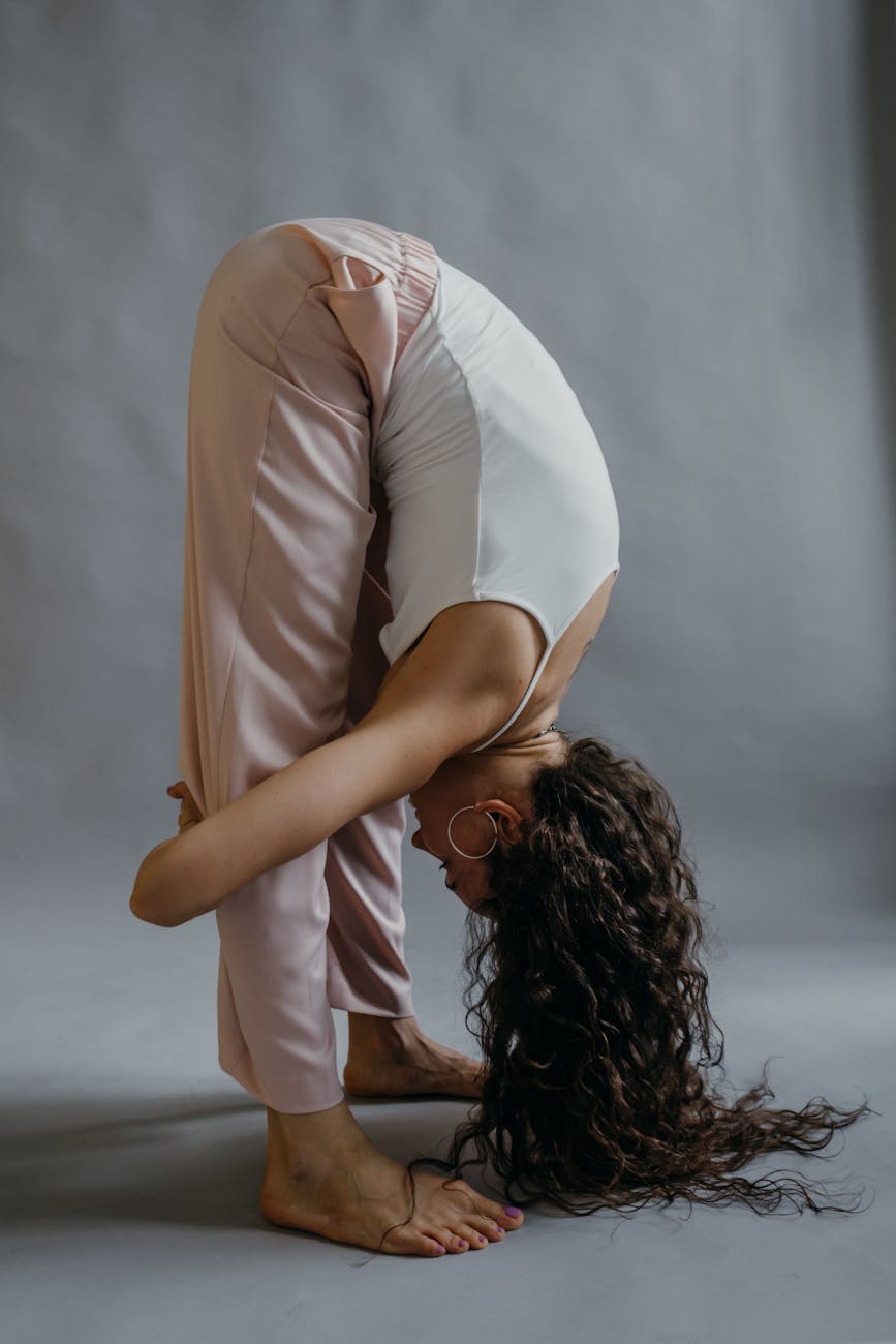A person in a graceful, flowing yoga posture.